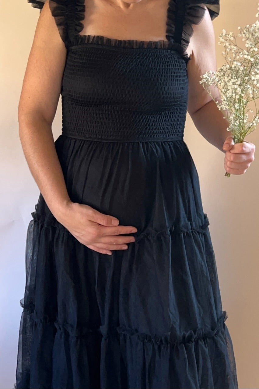 Black Smocked Mesh Ruffle Accent Maternity Midi Dress from PinkBlush