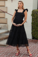Black Smocked Mesh Ruffle Accent Maternity Midi Dress from PinkBlush