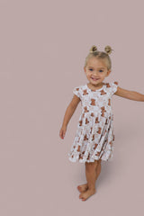 COZY BEAR DREAM RUFFLE DRESS from DREAM BIG LITTLE CO