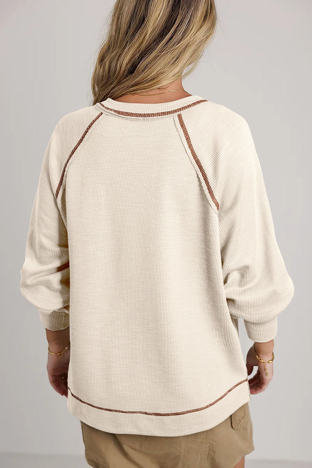 Beige Exposed Seam Textured Knit V Neck Pullover Top from MsDressly