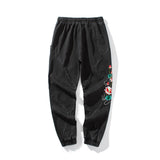Flowers of Peace Embroidery Joggers  From Niepce Inc