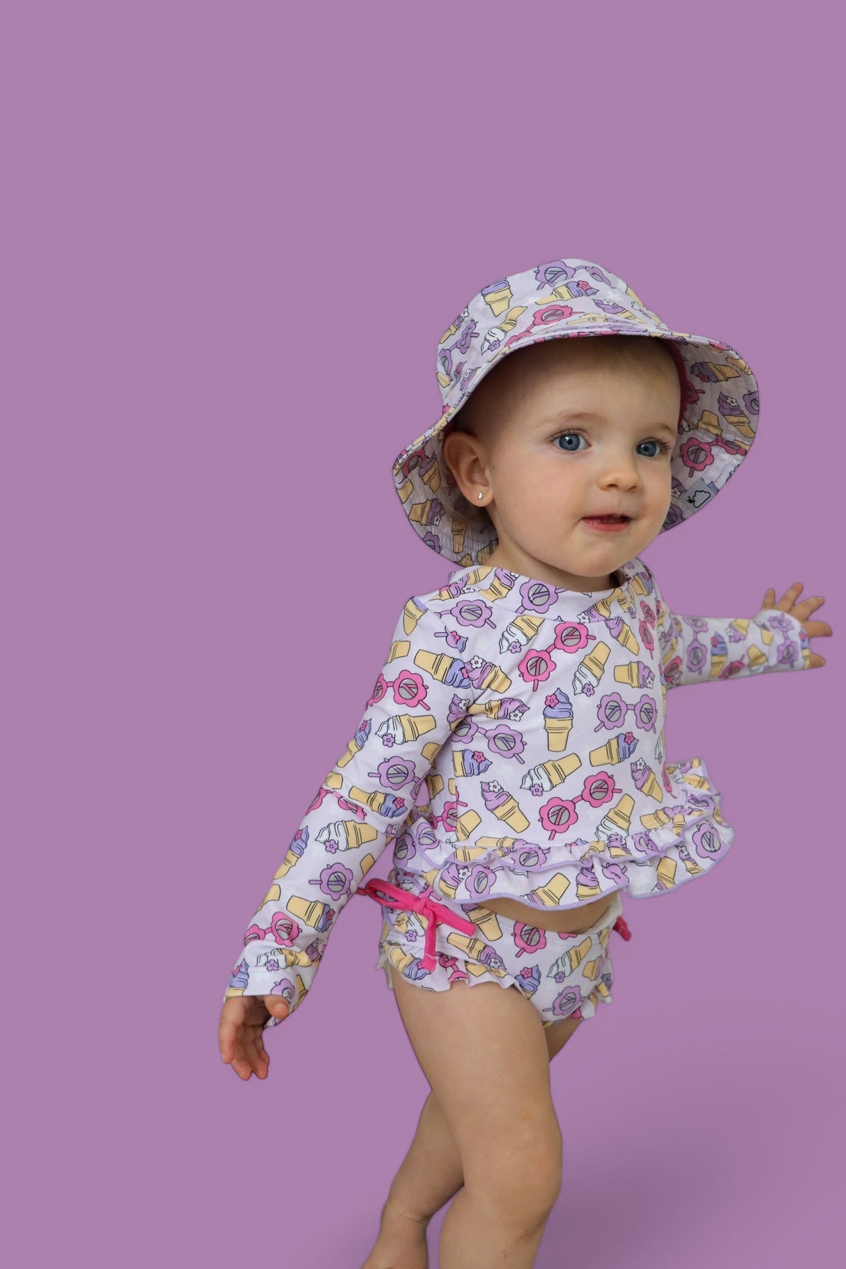 SWEET SUMMER DREAM RASH GUARD RUFFLE TWO-PIECE SWIM SUIT from DREAM BIG LITTLE CO