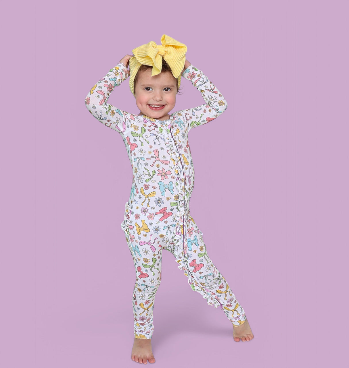 BOW GARDEN DREAM RUFFLE ROMPER from DREAM BIG LITTLE CO