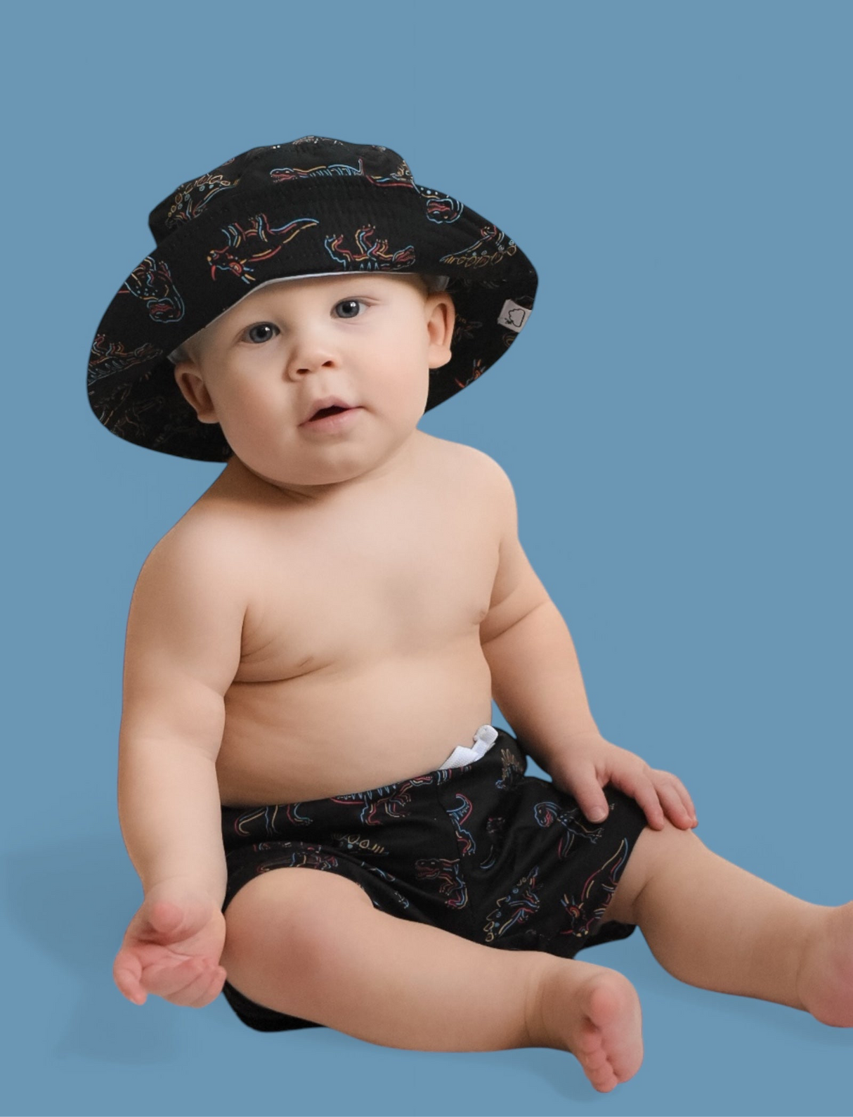 DINOSNORE DREAM BUCKET HAT from DREAM BIG LITTLE CO