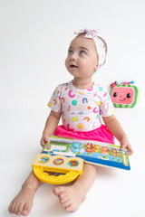 Dream Big Little Co x CoComelon ALPHABET DREAM TUTU SHORT SLEEVE BODYSUIT DRESS from DREAM BIG LITTLE CO