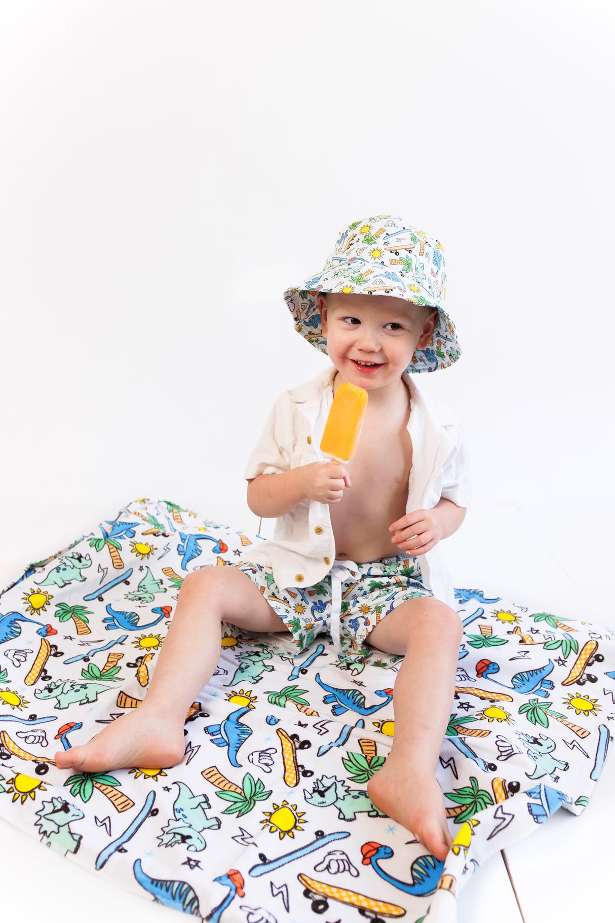EXCLUSIVE SURF-O-SAURUS DREAM SWIM TRUNKS from DREAM BIG LITTLE CO