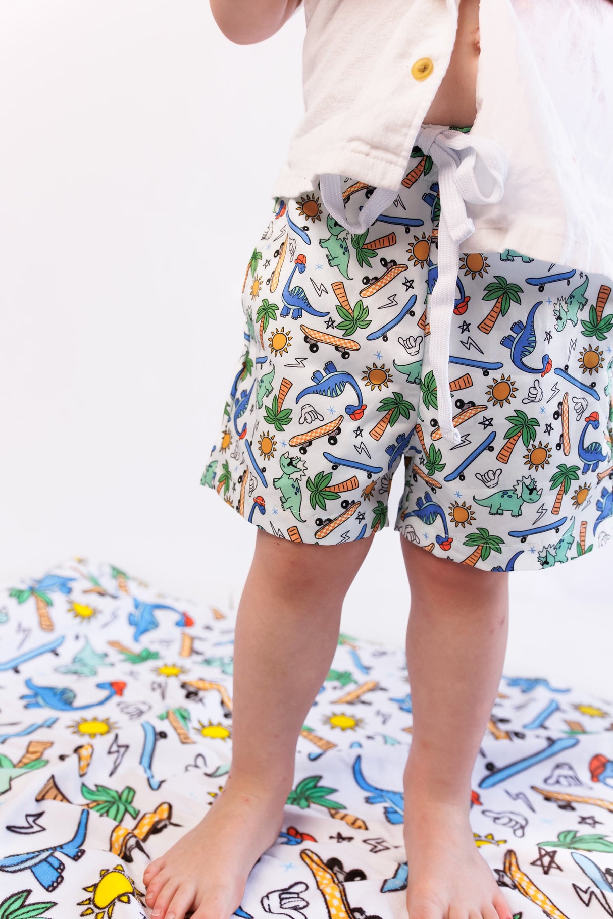 EXCLUSIVE SURF-O-SAURUS DREAM SWIM TRUNKS from DREAM BIG LITTLE CO