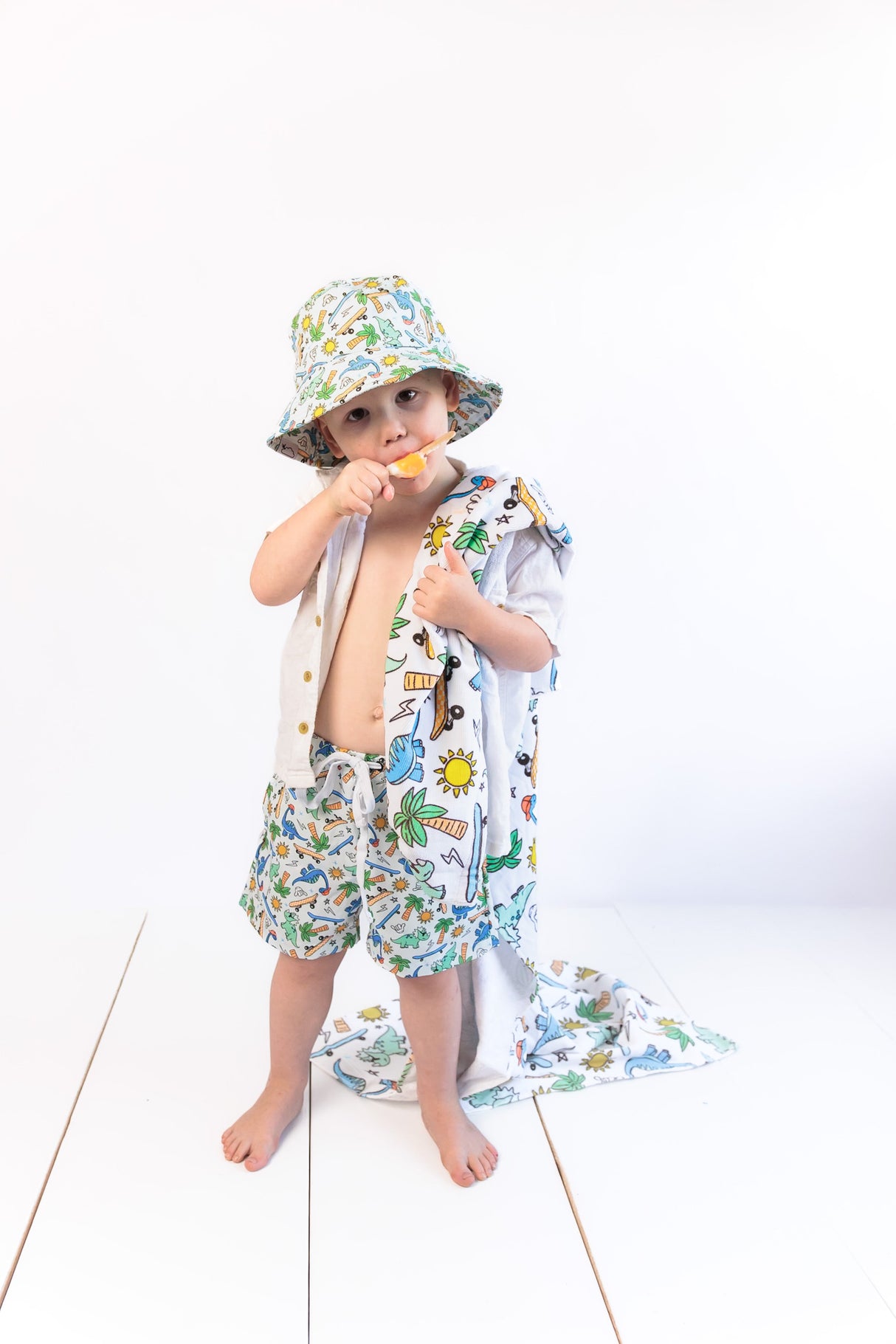 EXCLUSIVE SURF-O-SAURUS DREAM SWIM TRUNKS from DREAM BIG LITTLE CO