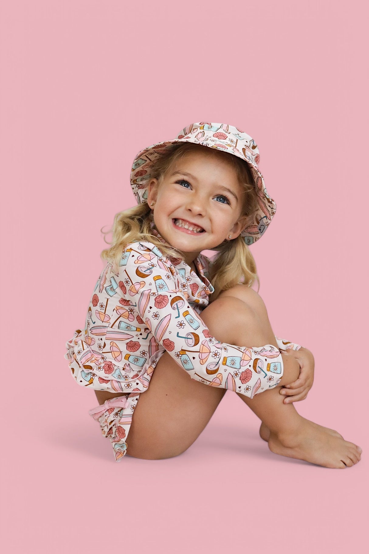 FUN IN THE SUN DREAM TWO-PIECE RASH GUARD RUFFLE SWIM SUIT from DREAM BIG LITTLE CO