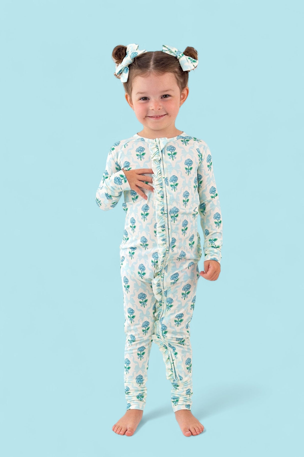 BLUE RIBBON BLOOMS DREAM RUFFLE ROMPER from DREAM BIG LITTLE CO