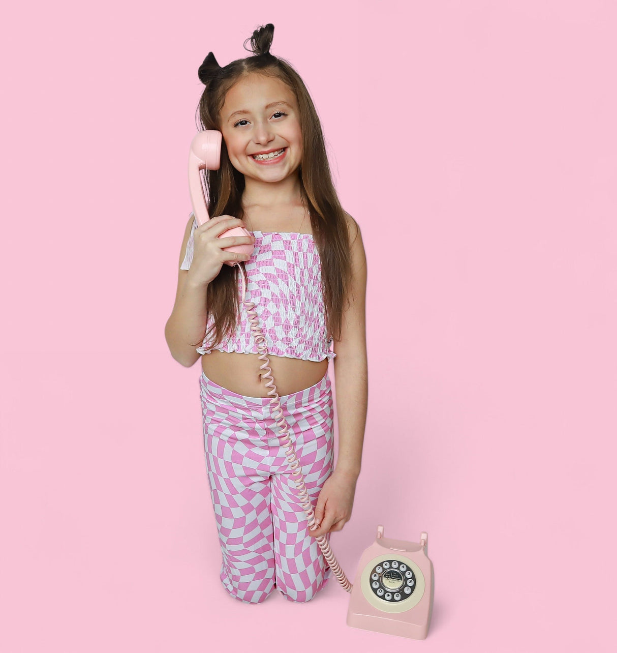 BUBBLEGUM WAVY CHECKERS DREAM SMOCKED FLARE SET from DREAM BIG LITTLE CO