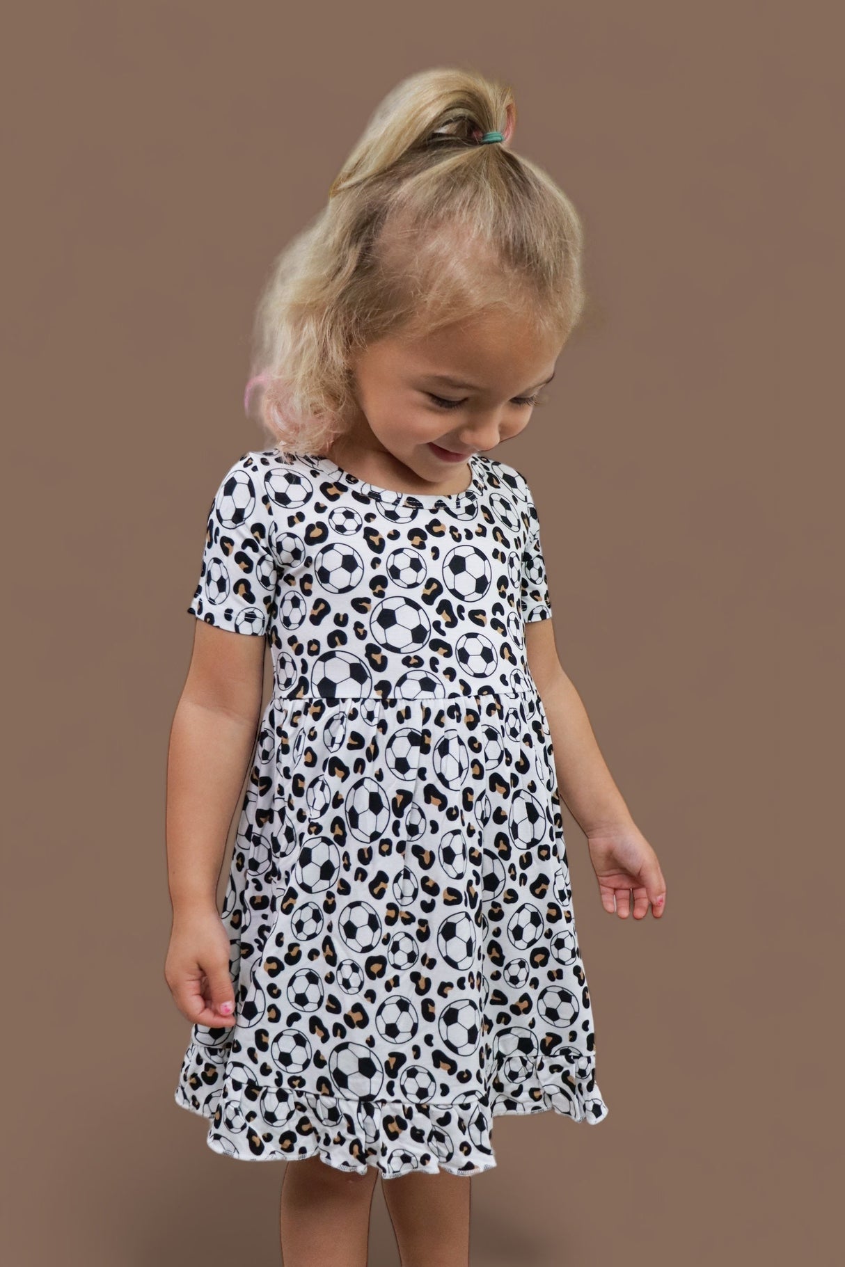 WILD GOALS DREAM RUFFLE DRESS from DREAM BIG LITTLE CO
