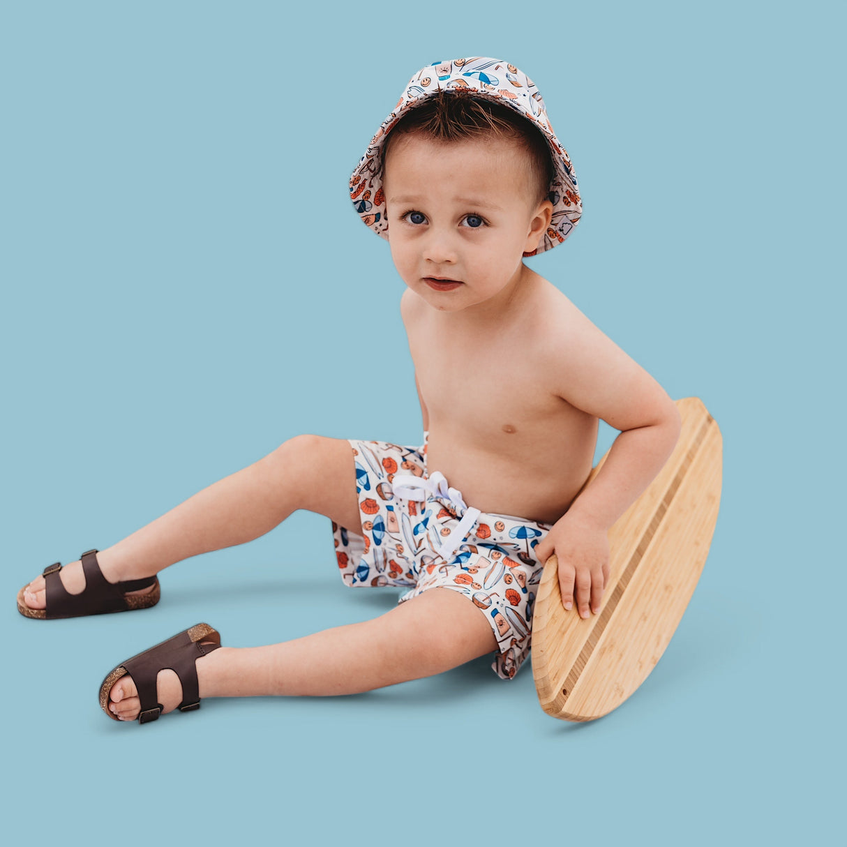 CHASE THE SUN BOY'S DREAM SWIM TRUNKS from DREAM BIG LITTLE CO