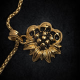 Sunflower Gold Skull Necklace from Zapps Clothing