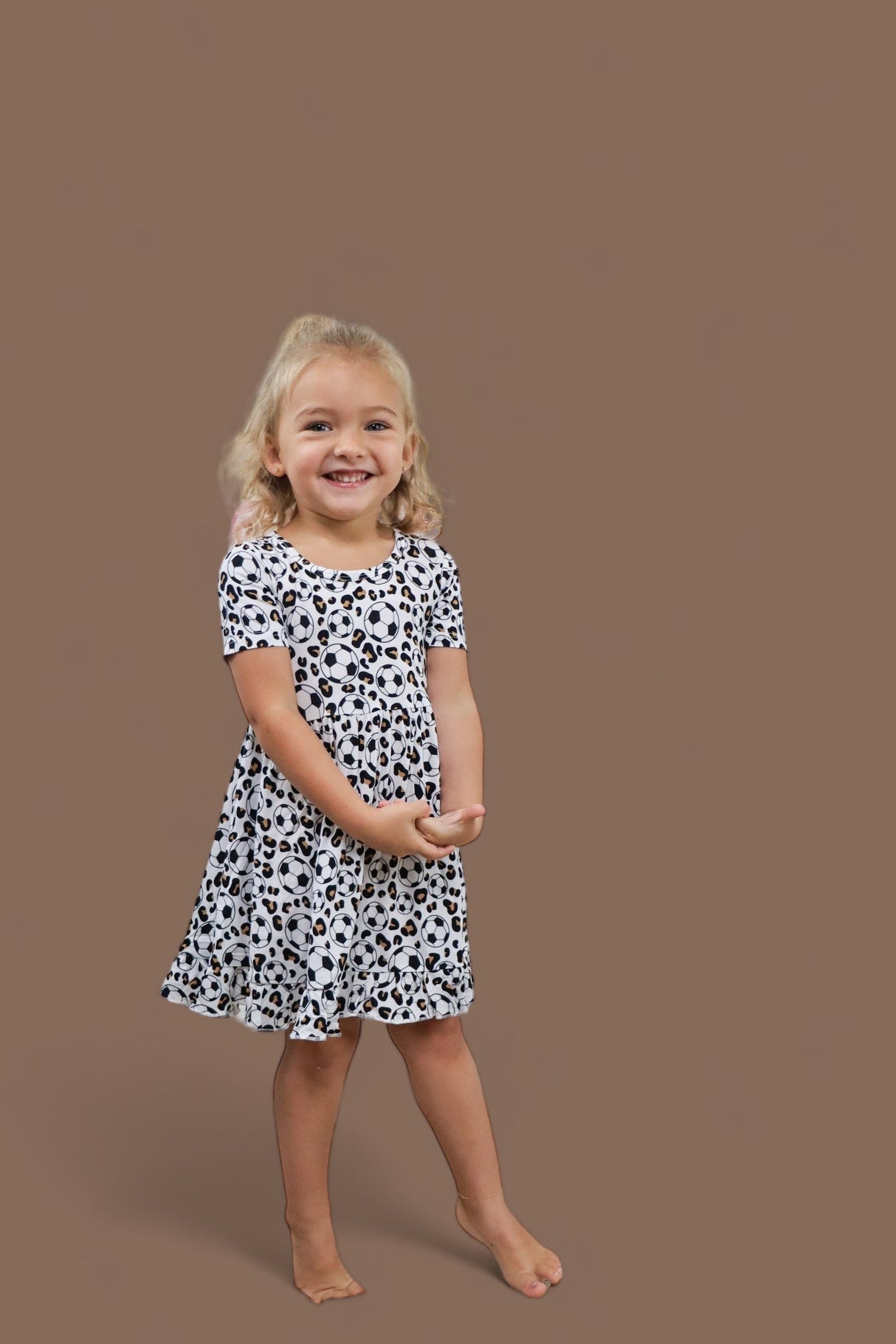 WILD GOALS DREAM RUFFLE DRESS from DREAM BIG LITTLE CO