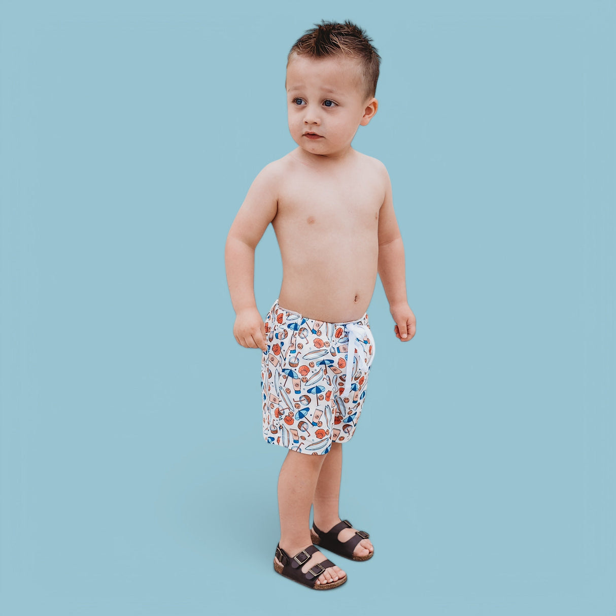 CHASE THE SUN BOY'S DREAM SWIM TRUNKS from DREAM BIG LITTLE CO