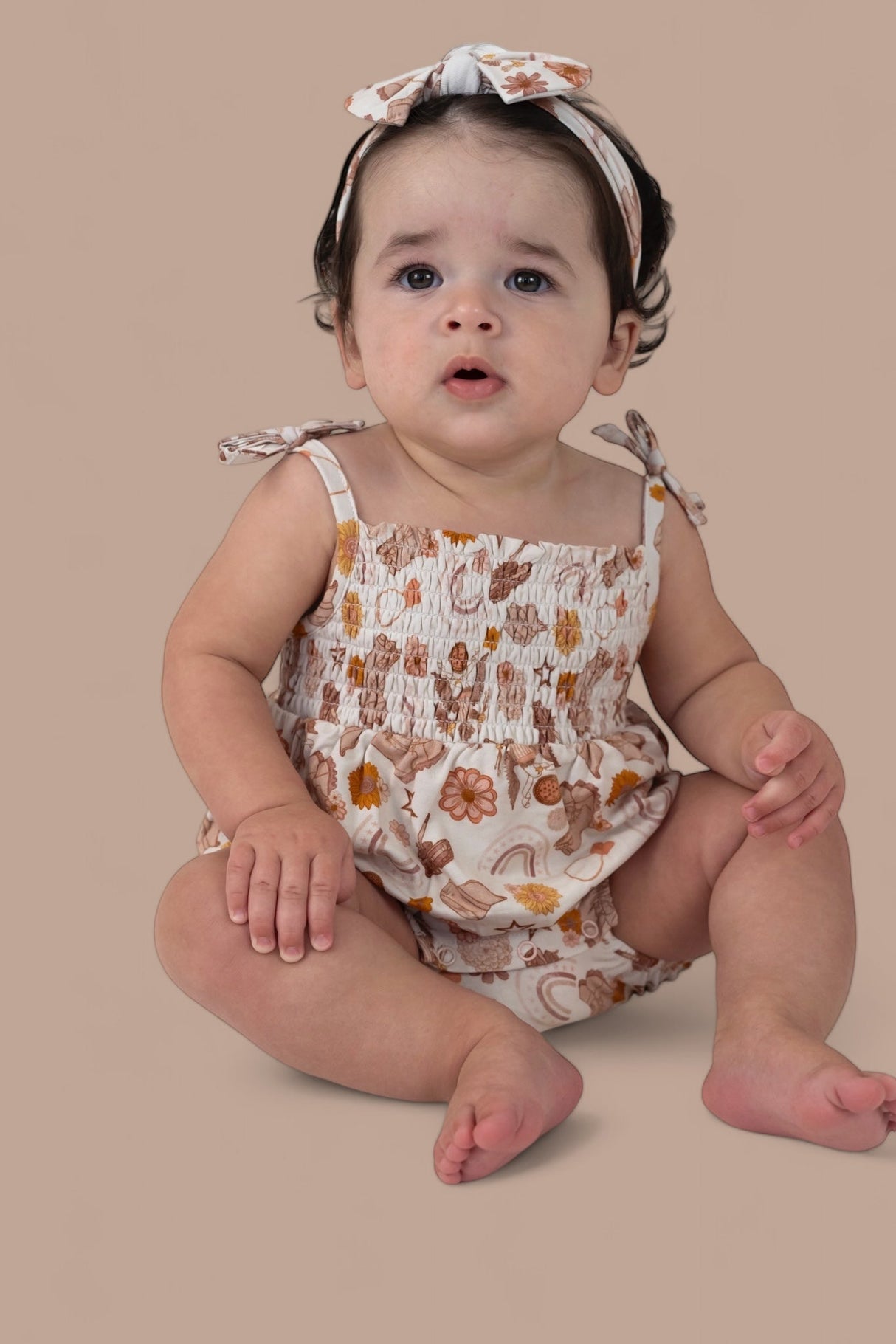 FLOWERS AND BOOTS DREAM BUBBLE ROMPER from DREAM BIG LITTLE CO