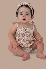 FLOWERS AND BOOTS DREAM BUBBLE ROMPER from DREAM BIG LITTLE CO
