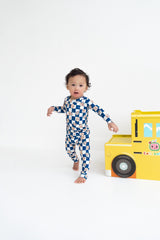 Dream Big Little Co x CoComelon JJ STARRY NIGHT CHECKERS DREAM ROMPER from DREAM BIG LITTLE CO