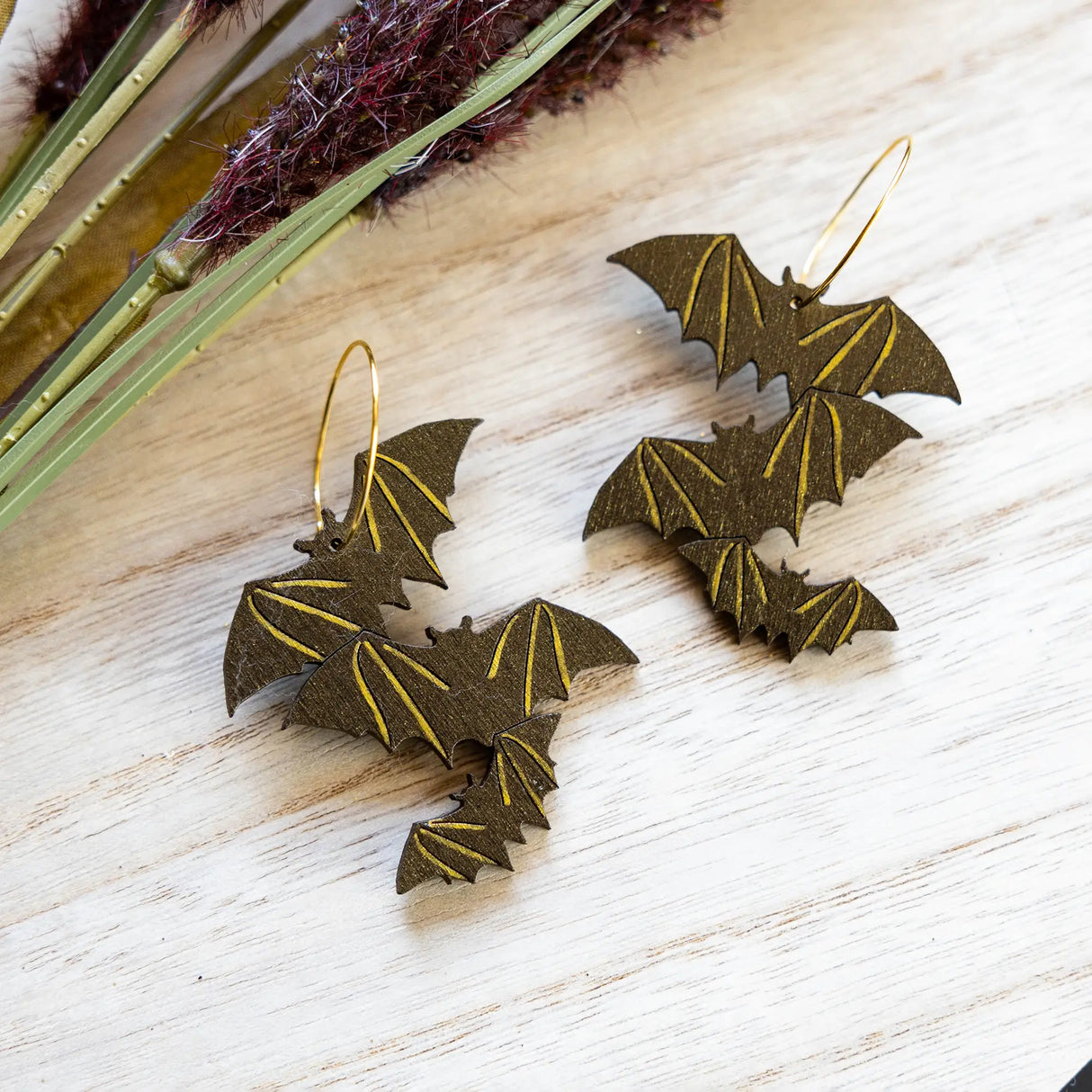 Shimmery Bat Hoops from LE CHIC MIAMI