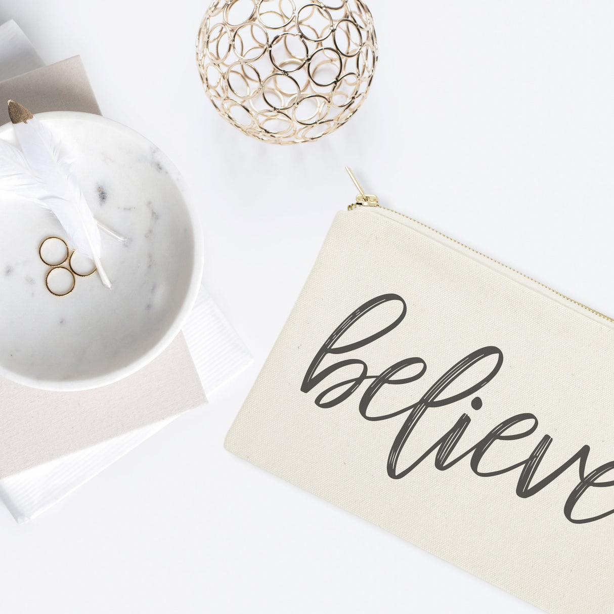Believe Cotton Canvas Cosmetic Bag from The Cotton & Canvas Co.
