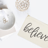Believe Cotton Canvas Cosmetic Bag from The Cotton & Canvas Co.
