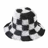 Checkerboard Patterned Straw Bucket Hat from Madeline Love