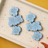Powder Blue Hydrangea Statement Earrings from LE CHIC MIAMI