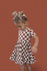 COPPER CHECKERS DREAM RUFFLE DRESS from DREAM BIG LITTLE CO