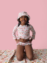 FUN IN THE SUN DREAM TWO-PIECE RASH GUARD RUFFLE SWIM SUIT from DREAM BIG LITTLE CO