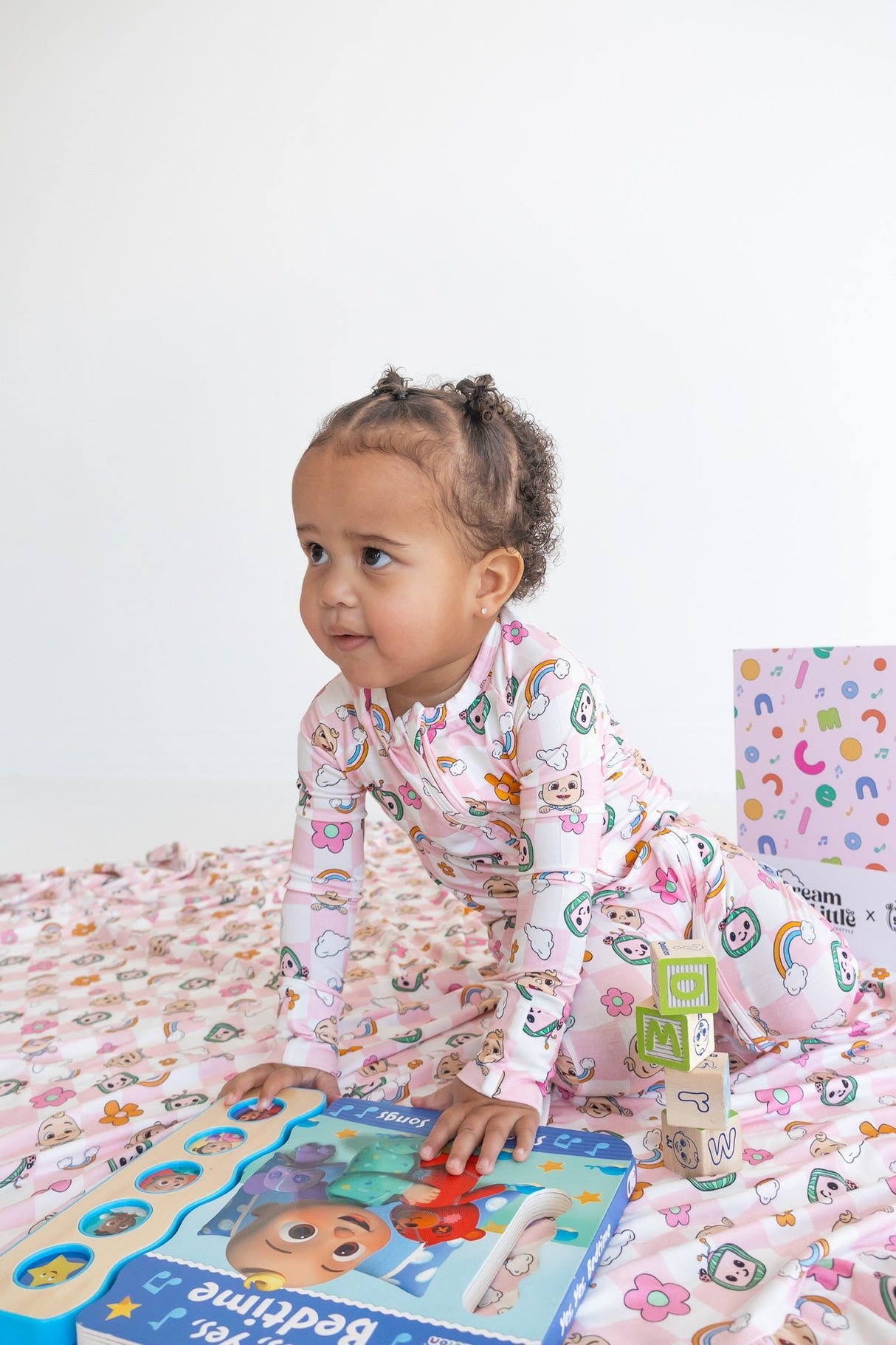Dream Big Little Co x CoComelon JJ RAINBOW CHECKERS DREAM ROMPER from DREAM BIG LITTLE CO