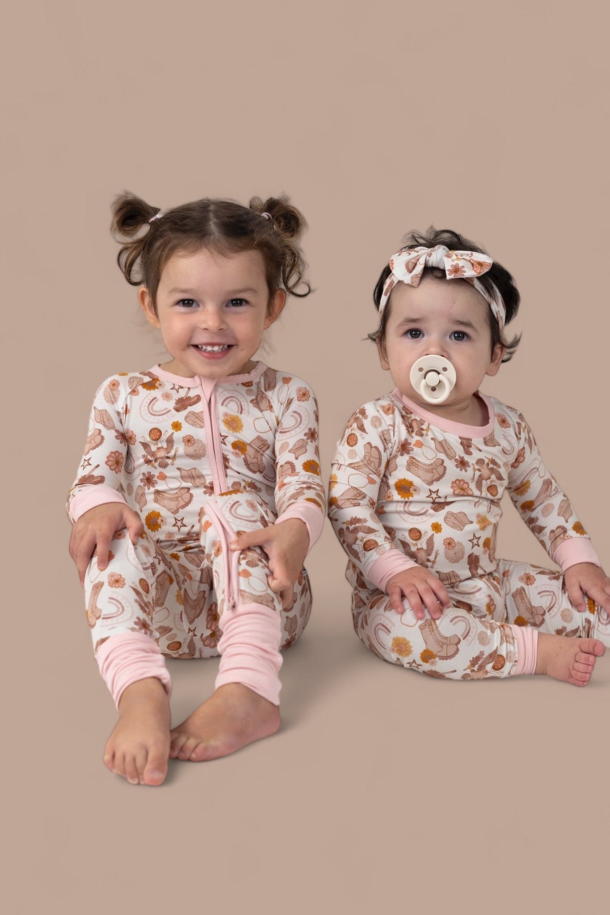 FLOWERS AND BOOTS DREAM ROMPER from DREAM BIG LITTLE CO
