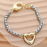 14K Gold Plated Two Tone Heart Charm Pointed Bracelet from Madeline Love