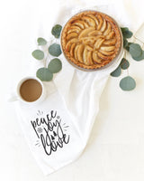 Peace, Joy, Love Christmas Kitchen Tea Towel from The Cotton & Canvas Co.