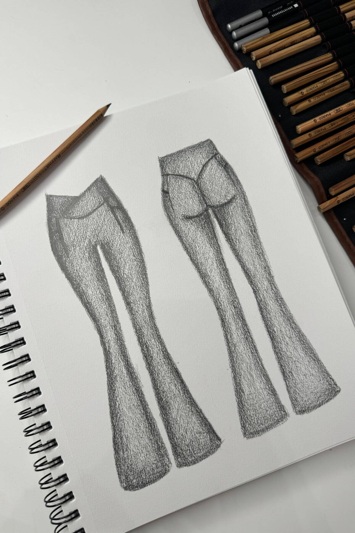 Crisscross Hourglass® Flared Leggings with Pockets - Black from POPFLEX