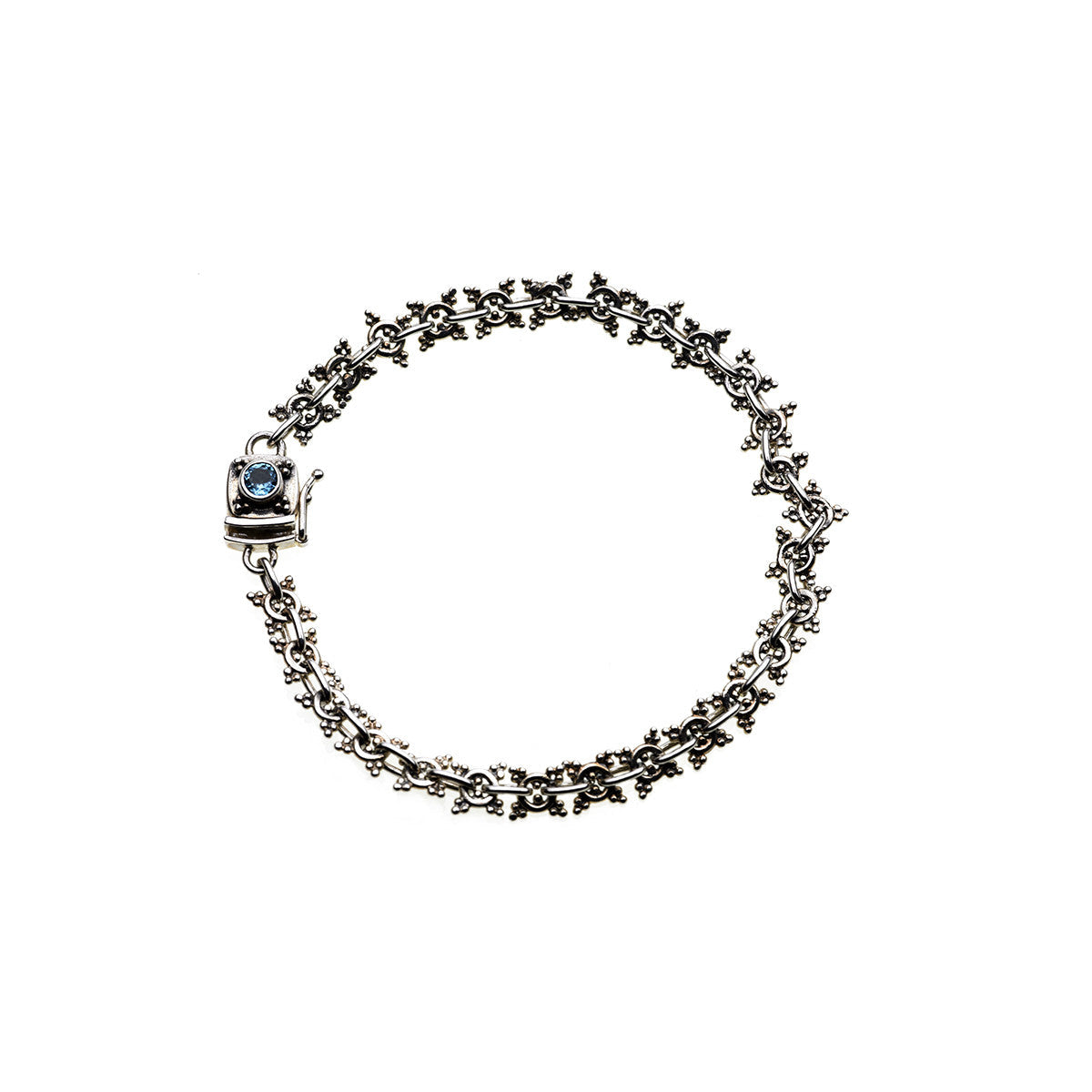 Dharmachakra Mandalas Sterling Silver & Blue Topaz Bracelet from Cynthia Gale New York