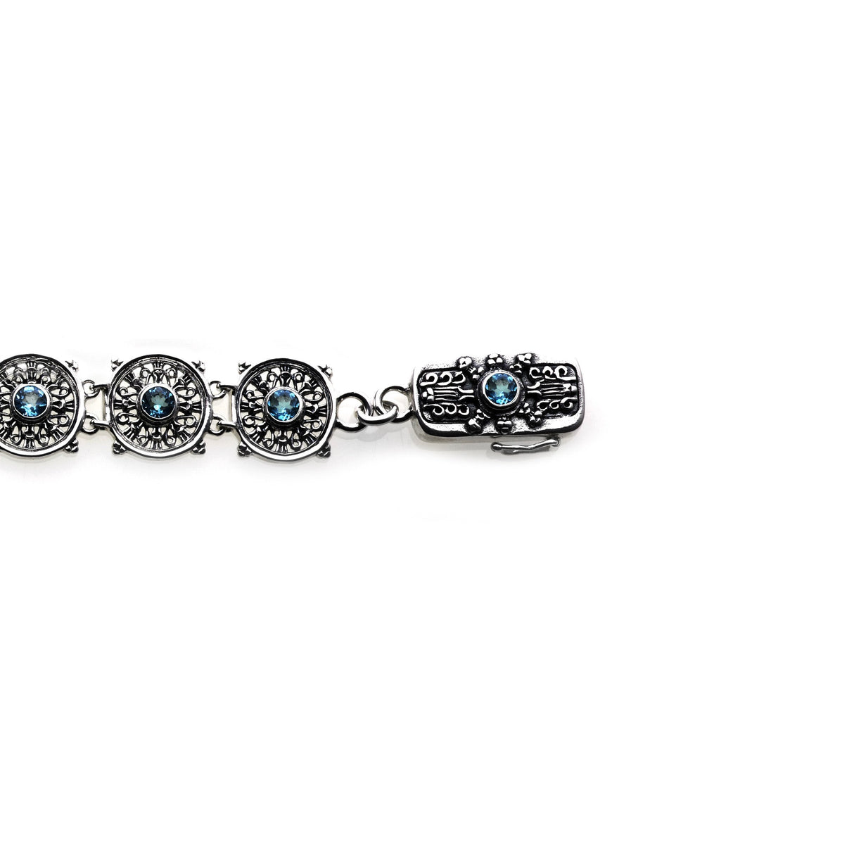 Dharmachakra Noble Truth Sterling Silver & Blue Topaz Bracelet from Cynthia Gale New York