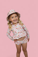 FUN IN THE SUN DREAM TWO-PIECE RASH GUARD RUFFLE SWIM SUIT from DREAM BIG LITTLE CO