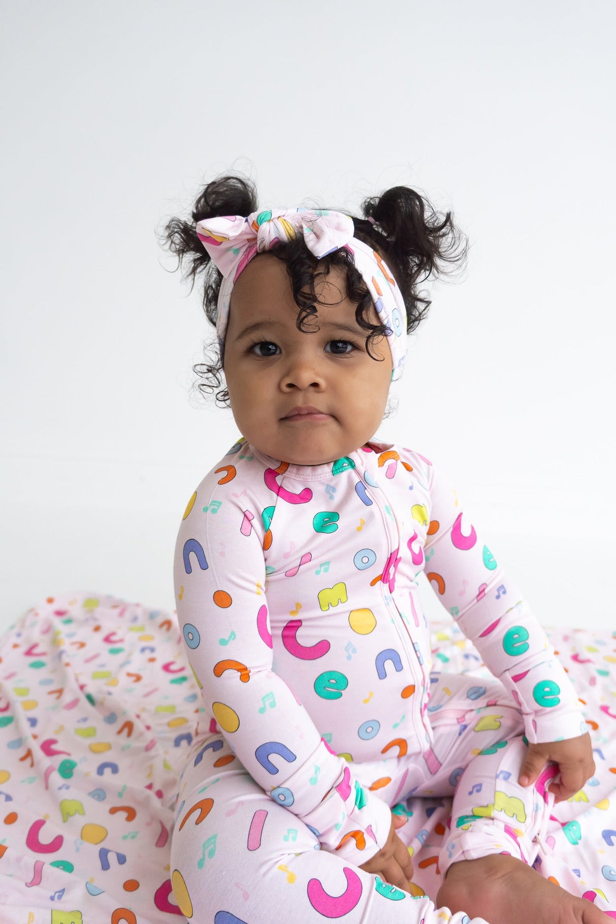 Dream Big Little Co x CoComelon ALPHABET DREAM ROMPER from DREAM BIG LITTLE CO