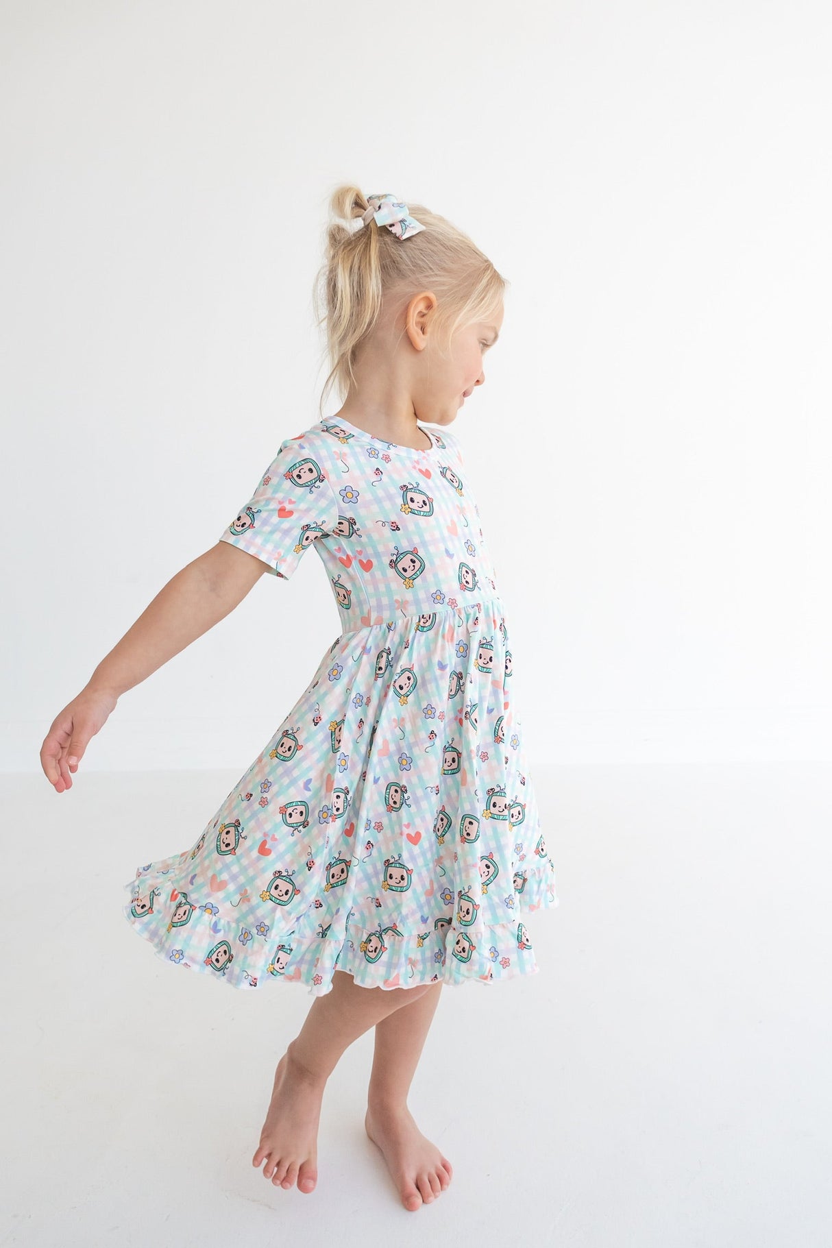 Dream Big Little Co x CoComelon SPRINGTIME MELON SHORT SLEEVE DREAM RUFFLE DRESS from DREAM BIG LITTLE CO