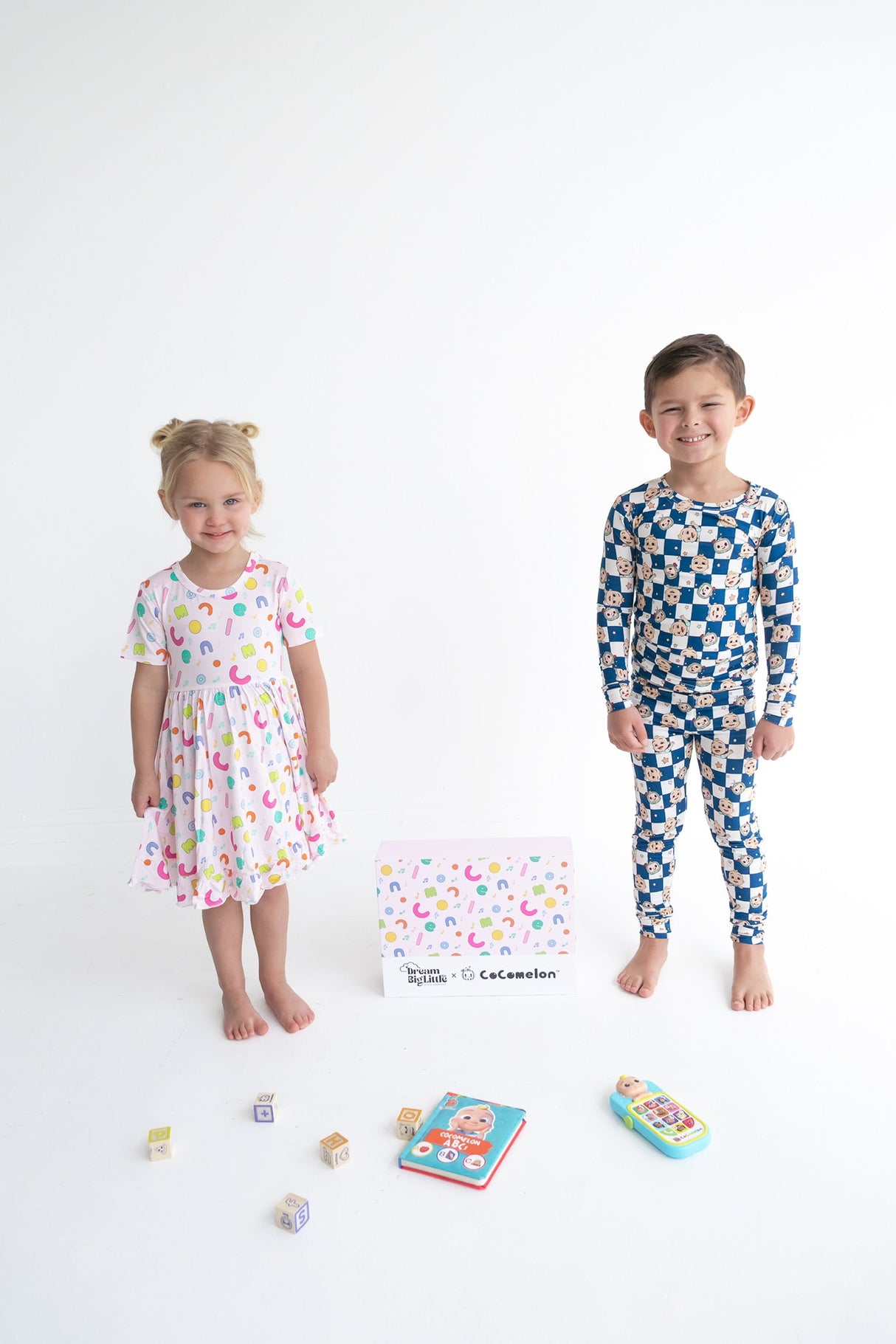 Dream Big Little Co x CoComelon ALPHABET SHORT SLEEVE DREAM RUFFLE DRESS from DREAM BIG LITTLE CO
