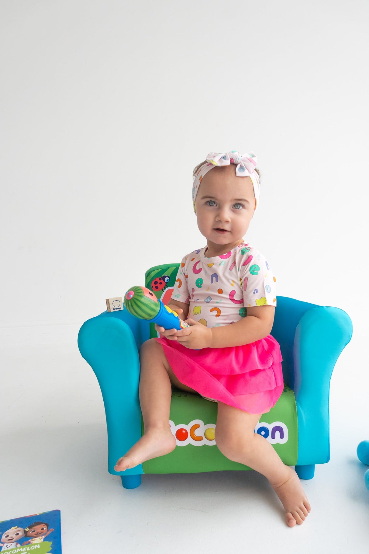 Dream Big Little Co x CoComelon ALPHABET DREAM TUTU SHORT SLEEVE BODYSUIT DRESS from DREAM BIG LITTLE CO