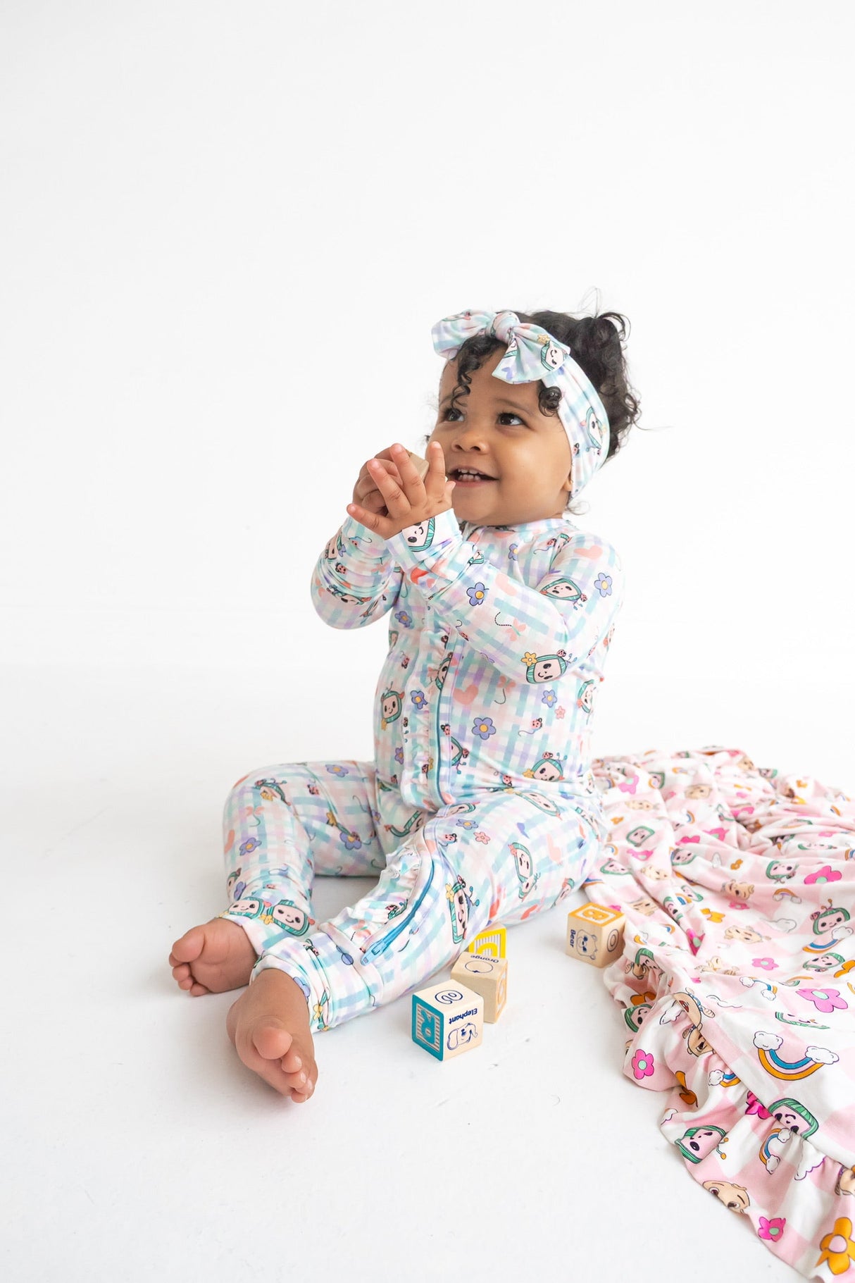 Dream Big Little Co x CoComelon SPRINGTIME MELON DREAM RUFFLE ROMPER from DREAM BIG LITTLE CO