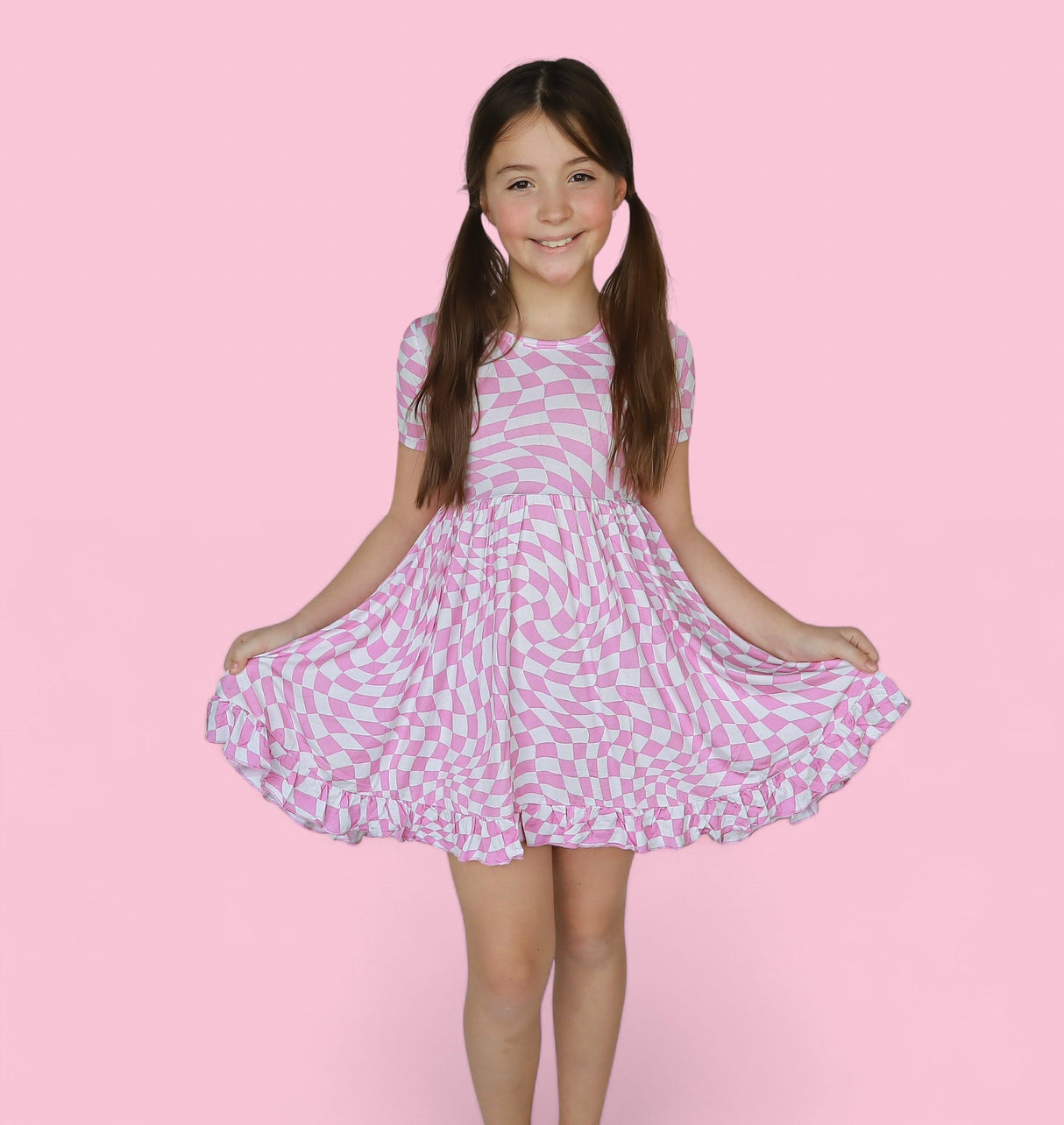 BUBBLEGUM WAVY CHECKERS DREAM RUFFLE DRESS from DREAM BIG LITTLE CO