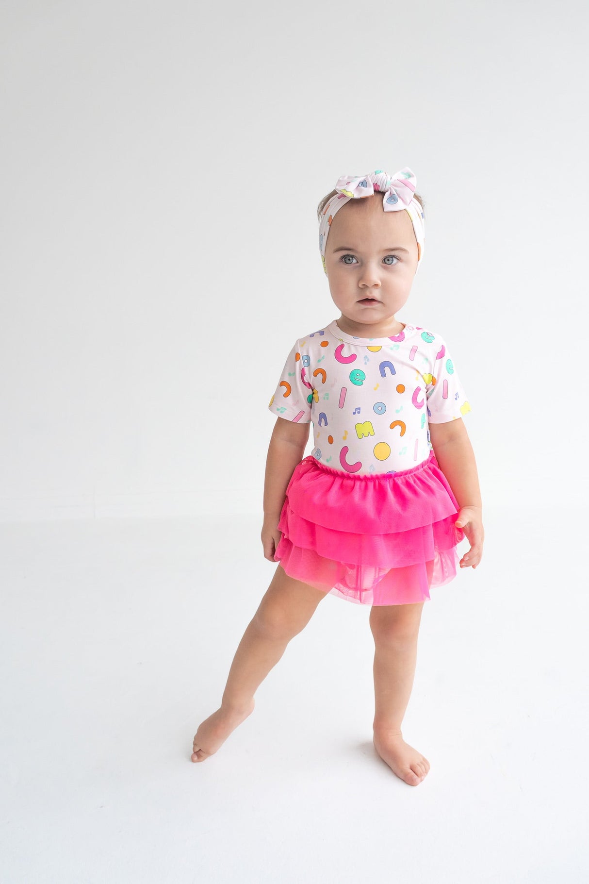 Dream Big Little Co x CoComelon ALPHABET DREAM TUTU SHORT SLEEVE BODYSUIT DRESS from DREAM BIG LITTLE CO