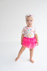Dream Big Little Co x CoComelon ALPHABET DREAM TUTU SHORT SLEEVE BODYSUIT DRESS from DREAM BIG LITTLE CO