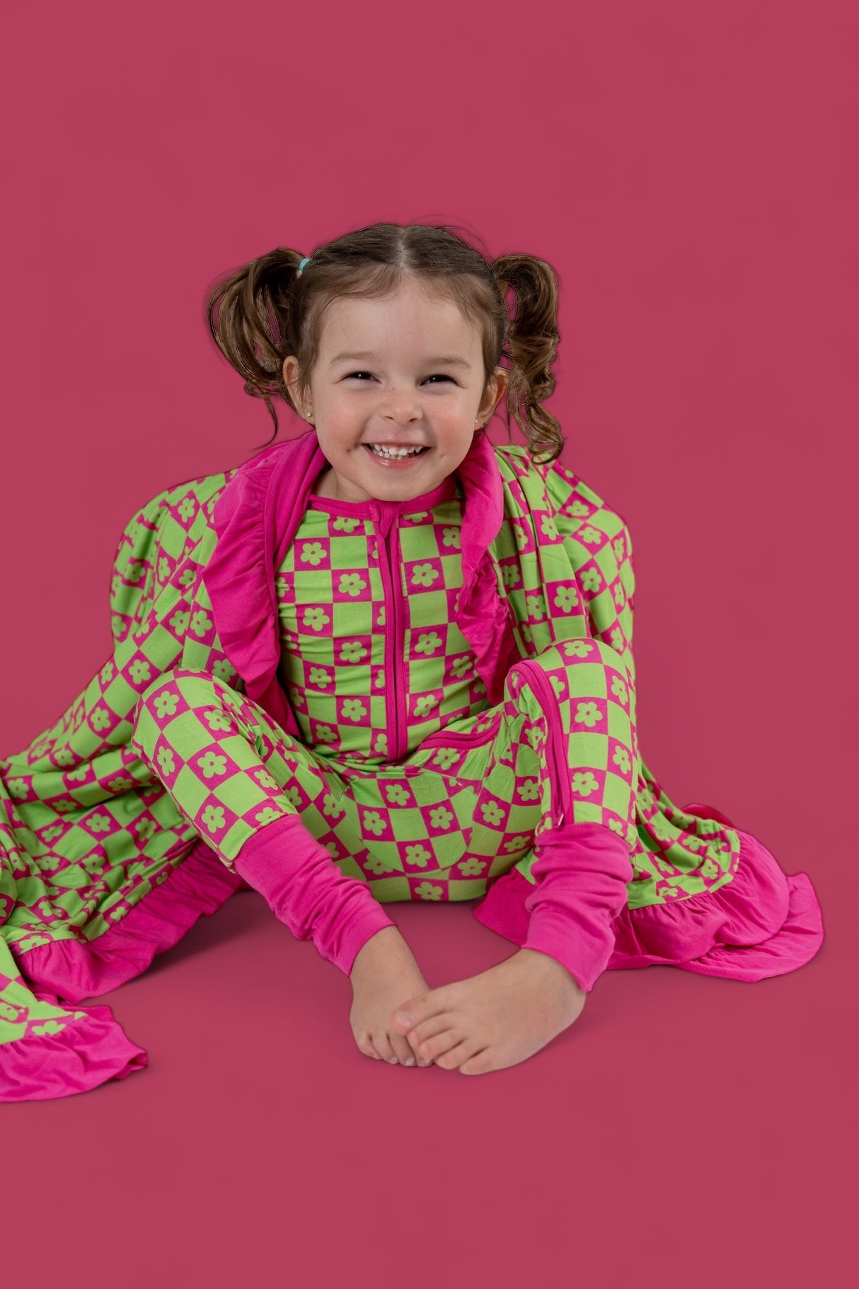 WILD DAISY CHECKERS DREAM ROMPER from DREAM BIG LITTLE CO
