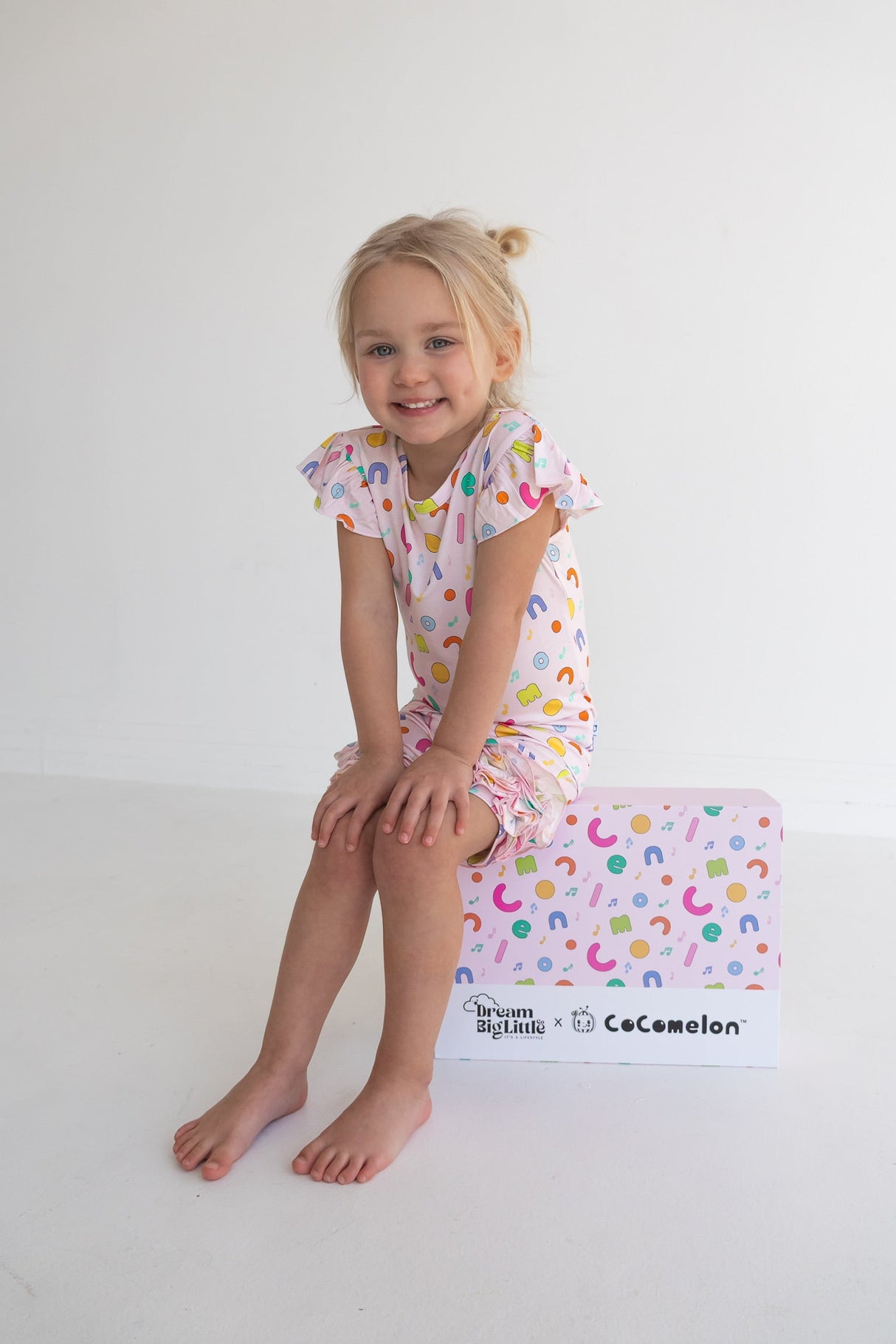 Dream Big Little Co x CoComelon ALPHABET DREAM RUFFLE SHORTS from DREAM BIG LITTLE CO