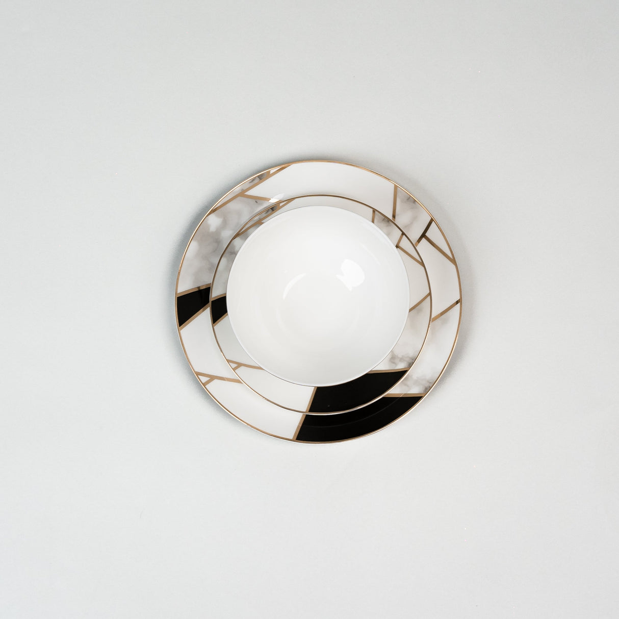 Ozarke's Transform Gold Marble Plate Set from Ozarké