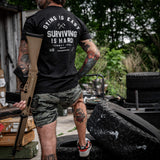 Dying is Easy. Surviving Is Hard Men's T-Shirt From Combat Iron Apparel